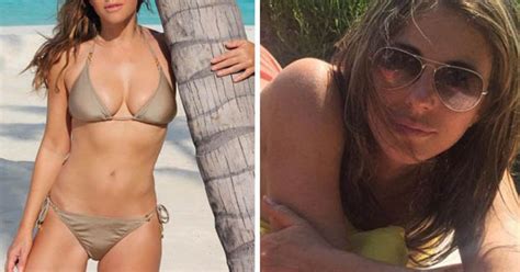 The Curves Time Cant Touch Liz Hurley Cranks Up The Cleavage In Tiny Bikini Daily Star
