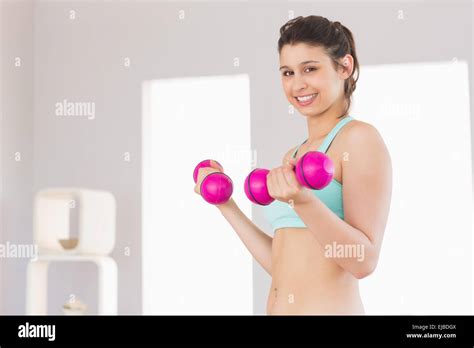 Fit Brunette Holding Pink Dumbbells Stock Photo Alamy