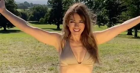 Liz Hurley Embraces Heatwave As She Prances Around A Field In Gold Bikini Irish Mirror Online