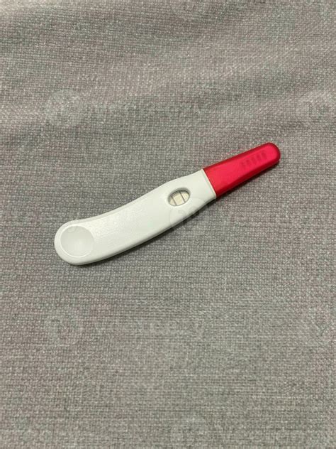 Positive Pregnancy Test On A Gray Blanket 35043074 Stock Photo At Vecteezy