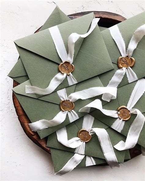 Green Handmade Envelopes With Wax Seal And Silk Ribbon © Papira