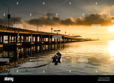 Beautiful Sunrise Over Penang Bridge During Weekend A Moment Of Calm