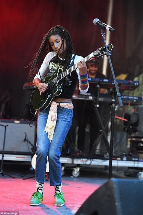 Play it loud! The singer, 16, wore a vintage shirt and jeans as she ...