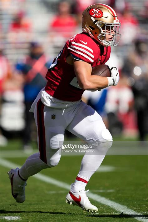 Christian Mccaffrey Of The San Francisco 49ers Carries The Ball In