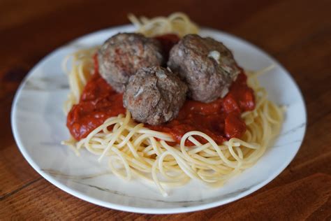 EASY AND SAUCY SPAGHETTI WITH CHEESE STUFFED MEATBALLS Navigating