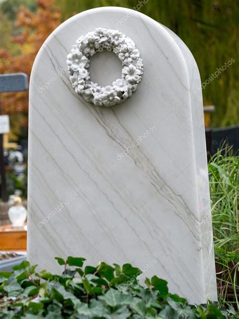 White marble tombstone Stock Photo by ©pryzmat 88238840