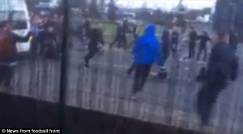 Football Hooligans Throw Bottles And Flares As Dozens Clash In The