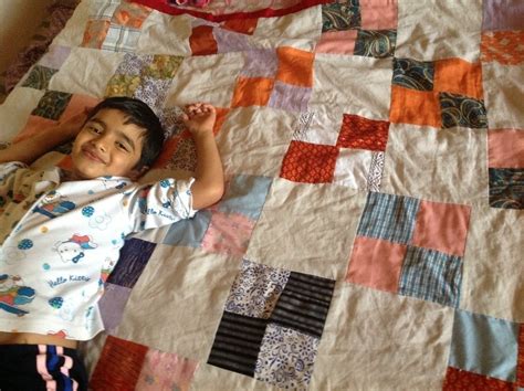 Quilt From Old Clothes · A Patchwork Quilt · Sewing on Cut Out + Keep