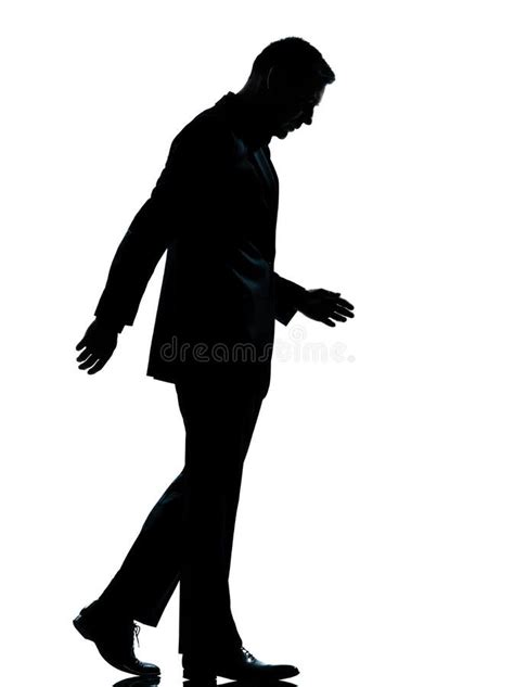 One Business Man Walking Looking Down Silhouette Stock Photo - Image of ...