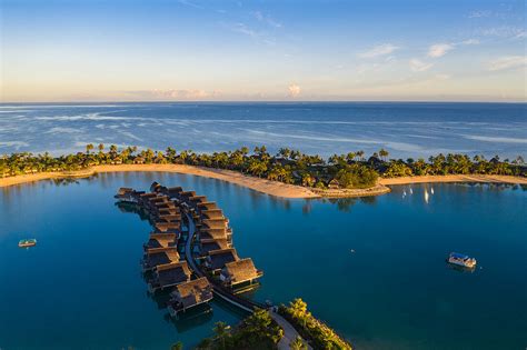 Aerial View Of Overwater Bungalows At License Image 71355717