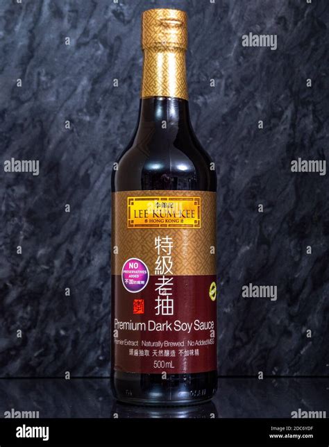 Closeup Of A Retail Unopened Bottle Of Lee Kum Kee Premium Dark Soy Sauce Against A Granite