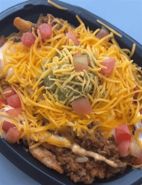 We Tried The New Taco Bell Enchirito And 7 Layer Nacho Fries