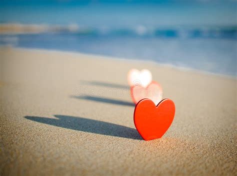 Heart on the shore stock photo. Image of affair, glowing - 23352402