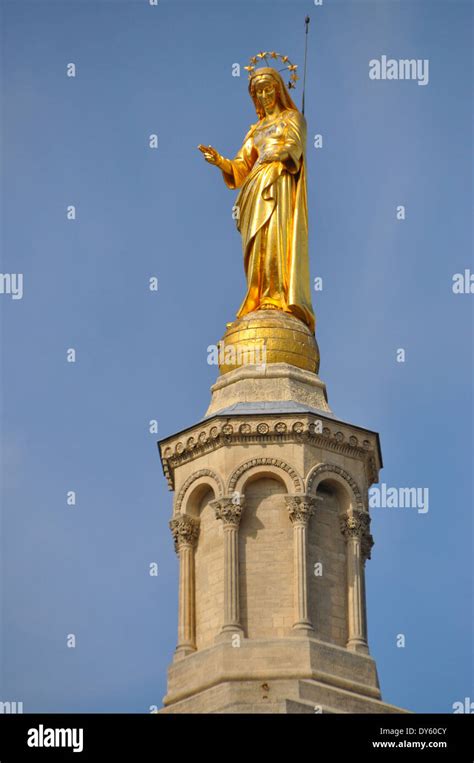 Gilded Statue Of The Virgin Mary On The Tower Of Avignon Cathedral