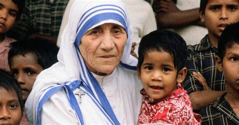 Mother Teresa Helping The Poor