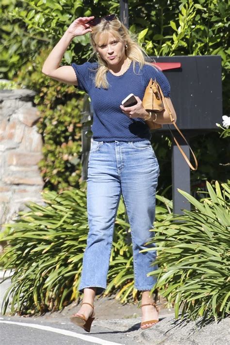 Reese Witherspoon In A Blue Blouse Heads To A Friends House In Santa