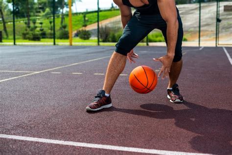 Free Photo | Man doing basketball tricks