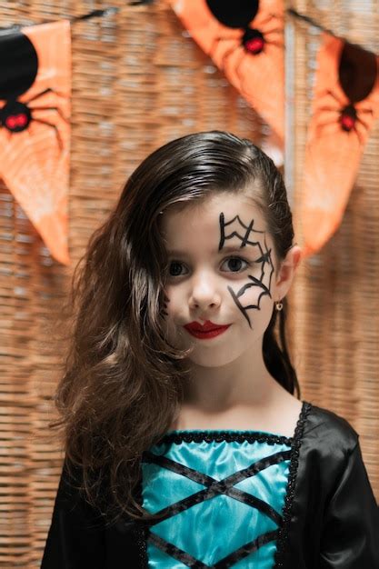 Premium Photo | Portrait of a girl with halloween makeup