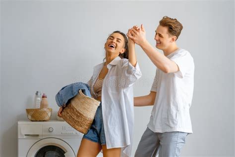 Loving Couple Is Doing Laundry Stock Image Image Of Girl Interior 220172375