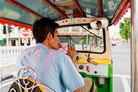 Tuk Tuk Taxi Driver In Bangkok Thailand By Stocksy Contributor