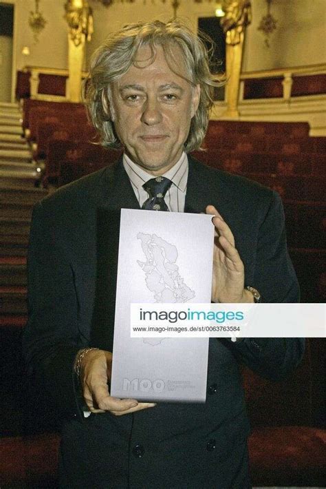 BobGeldof Receives M100 Media Award Sir Bob Geldof Holds His M100