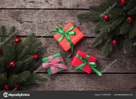 Christmas background with gift boxes Stock Photo by ©yulianny 320520440