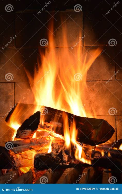 Roaring Fire in Fireplace with Logs and Flames Stock Image - Image of ...