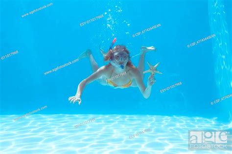 Cute Blonde Underwater In The Swimming Pool With Snorkel And Sta Stock