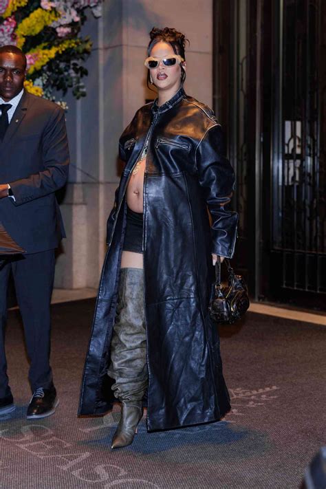 Rihanna Teamed Her Bump Baring Leather Trench Coat With The Shortest Skirt And The Tallest Thigh