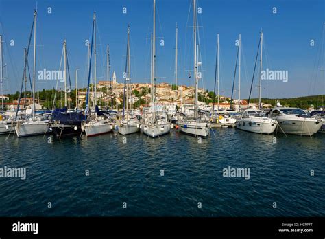 Vrsar Sailing Boats And Yachts In Harbour In Front Of Old Town Istria