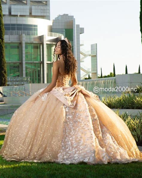 Elegant Shimmery Gold Long Train Quince Dress With A Bow Quinceanera