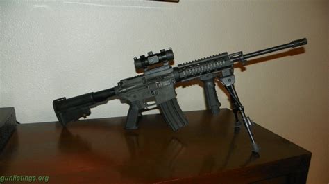 Gunlistings.org - Rifles Bushmaster Carbon 15 NIB W/accessories