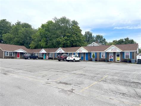 Great Commercial Building For Sale With Individual Suites On Corner Lot