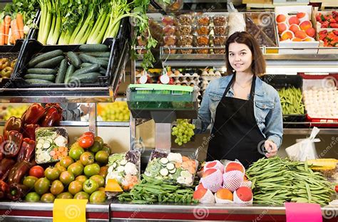 Shopping Assistant Weighing Fruit And Vegetables In Grocery Shop Stock Image Image Of Fruits