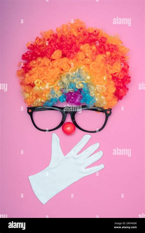 Funny Party Concept Surprised Face Formed With Gloves Rainbow Clown