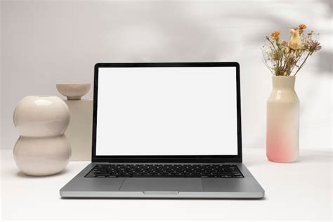 Premium Photo Laptop And Flowers Arrangement