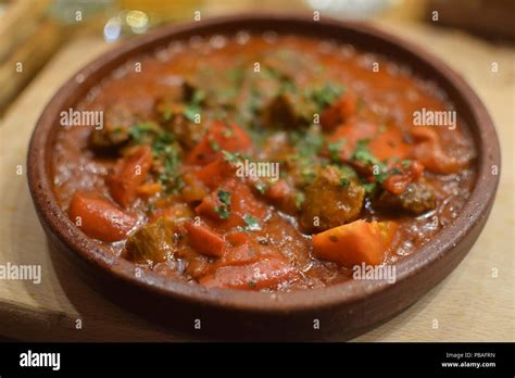 Russian cuisine - Hot bowl of Zharkoye. a stew made from beef, potatoes ...