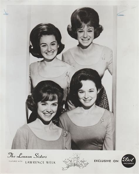 An Old Black And White Photo Of Four Women