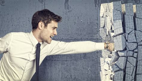 man punching wall stock  pictures royalty  images istock