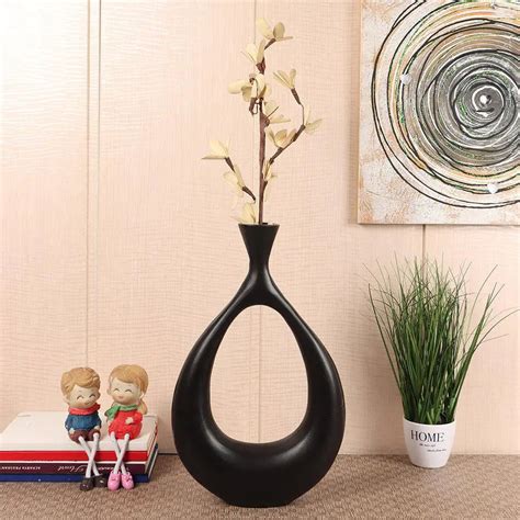 Black Modern Art Crafted Metal Flower Vase - WallMantra