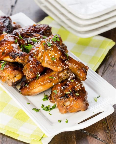 Sticky Asian Chicken Wings Garnish With Lemon