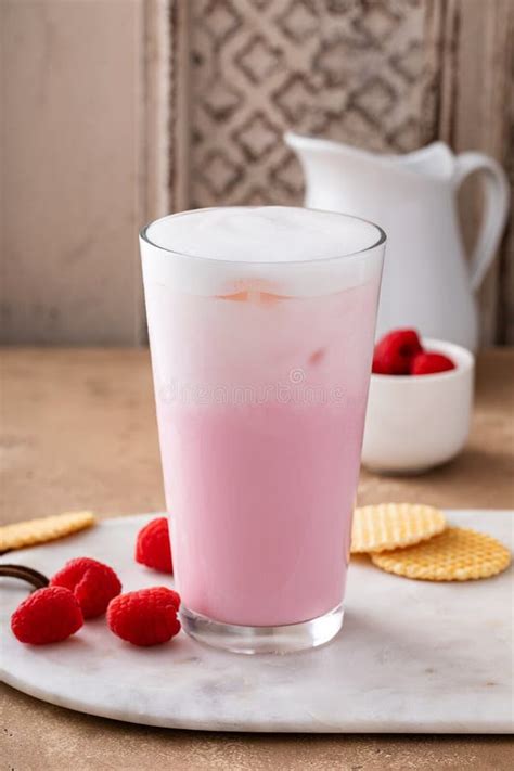 Strawberry Milk Drink With Cold Foam In A Tall Glass Stock Image