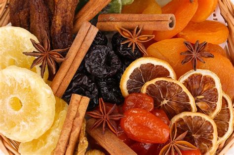 Premium Photo Dried Fruits With Cinnamon And Anise Stars Closeup