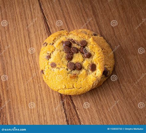 Homemade Biscuits With Chocolate Pieces On A Light Wood Table Stock