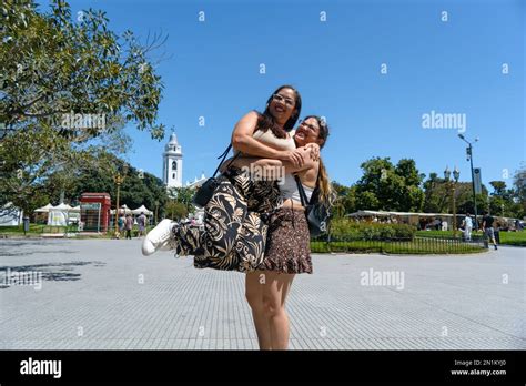 Mother And Daughter Latina Tourists Of Venezuelan Ethnicity On Vacation In Buenos Aires Playing