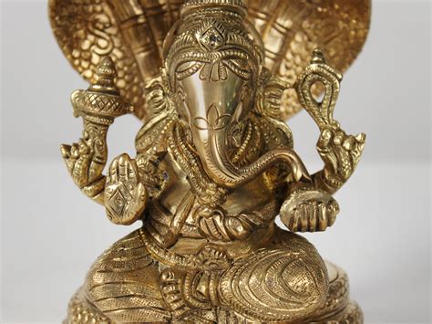 Brass Lord Ganesha Seated On Sheshnag Exotic India Art