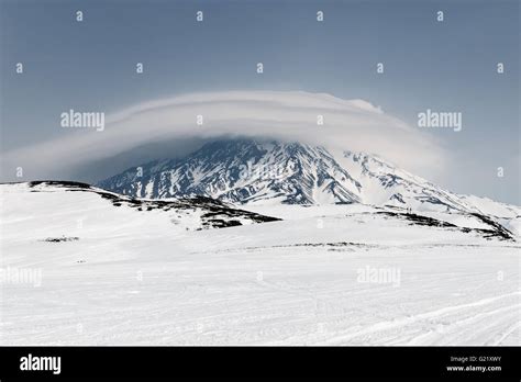 Wintry Mountain Landscape Of Kamchatka View Of Active Koryak Volcano