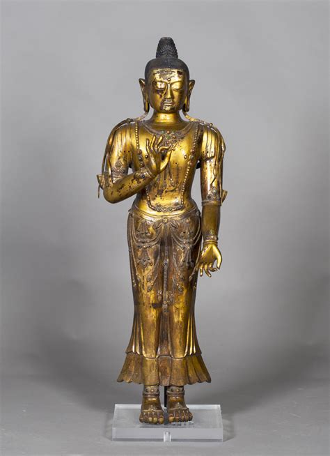 A Chinese Gilt Bronze Figure Of Buddha Probably Th Century Modelled