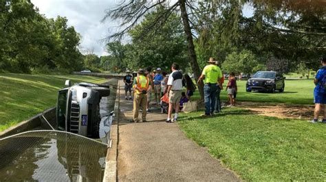 Caught On Camera Car Ends Up On Its Side In Allentown Fish Hatchery