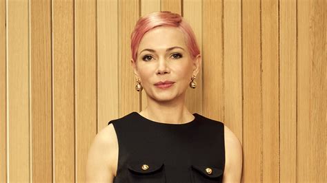 Michelle Williams Goes 60s Chic In A Sleeveless Black Dress While